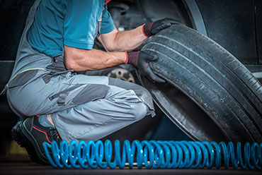 Installing replacing old vehicle tires
